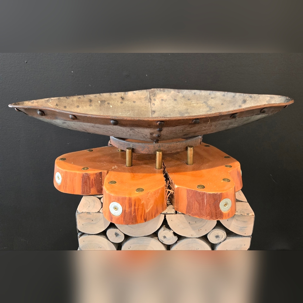 One of a kind decorative galvanized bowl standing on bullets and cedar slab EUC